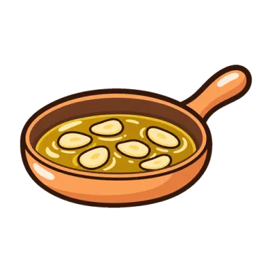 Garlic slices, pale gold in the oil
